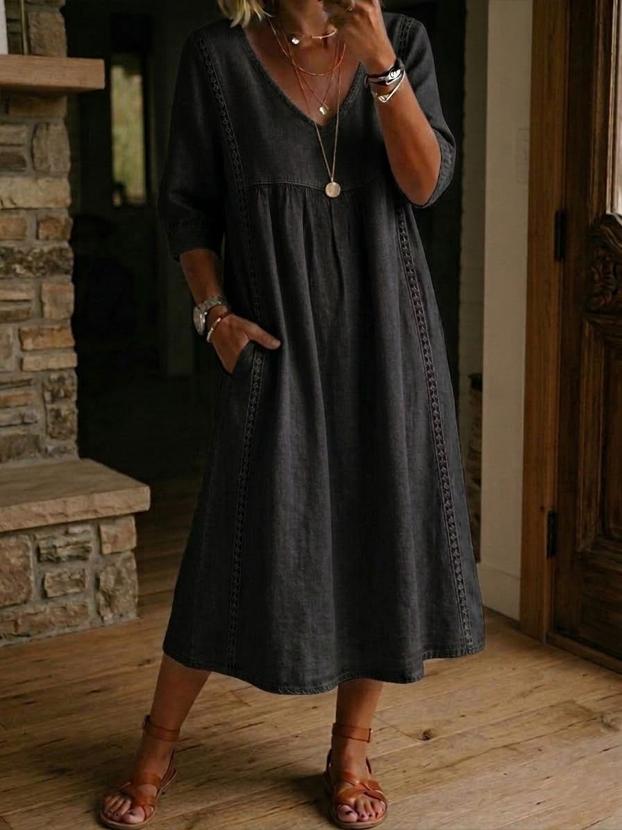 Black V-neck maxi dress with 3/4 sleeves and gathered bodice
