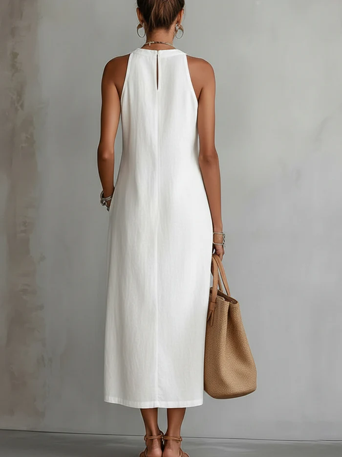 White sleeveless high-neck midi dress with keyhole back opening and long length