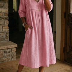 Blush pink V-neck maxi dress with 3/4 sleeves and gathered bodice