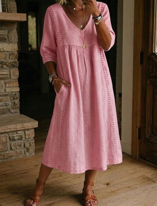 Blush pink V-neck maxi dress with 3/4 sleeves and gathered bodice