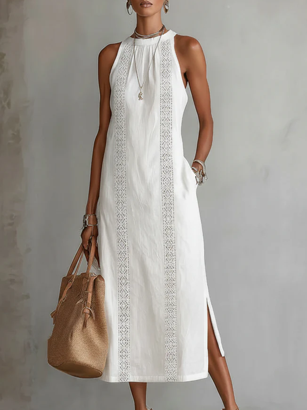 White sleeveless high-neck midi dress with vertical embroidered lace trim and side slit
