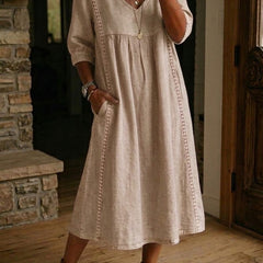 Beige V-neck maxi dress with 3/4 sleeves and gathered bodice
