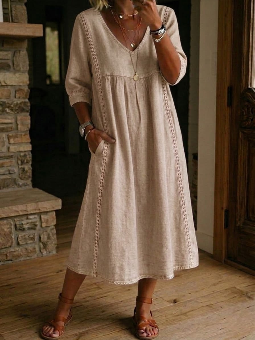 Beige V-neck maxi dress with 3/4 sleeves and gathered bodice