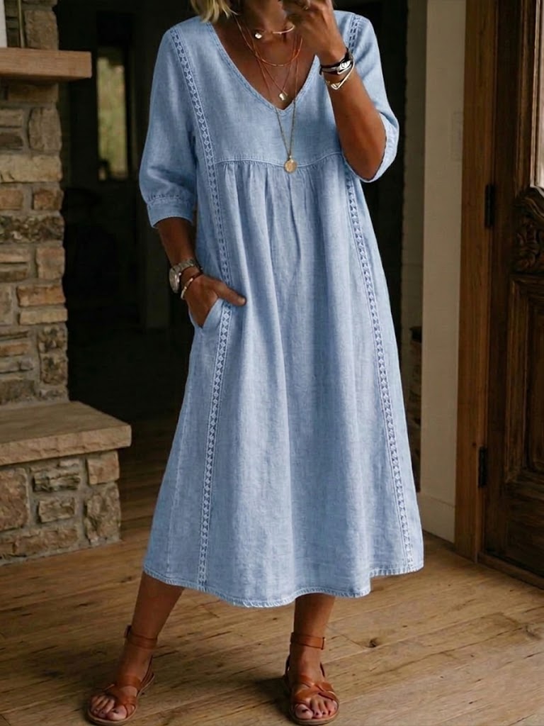 Blue V-neck maxi dress with 3/4 sleeves and gathered bodice
