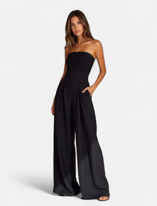 Black strapless lightweight jumpsuit with wide legs and flowing drape