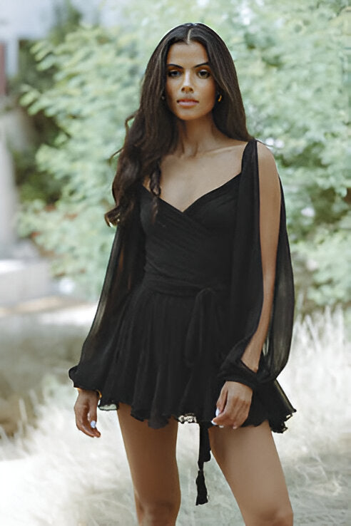 Black summer dress with square neckline, tiered skirt, and sheer bell sleeves