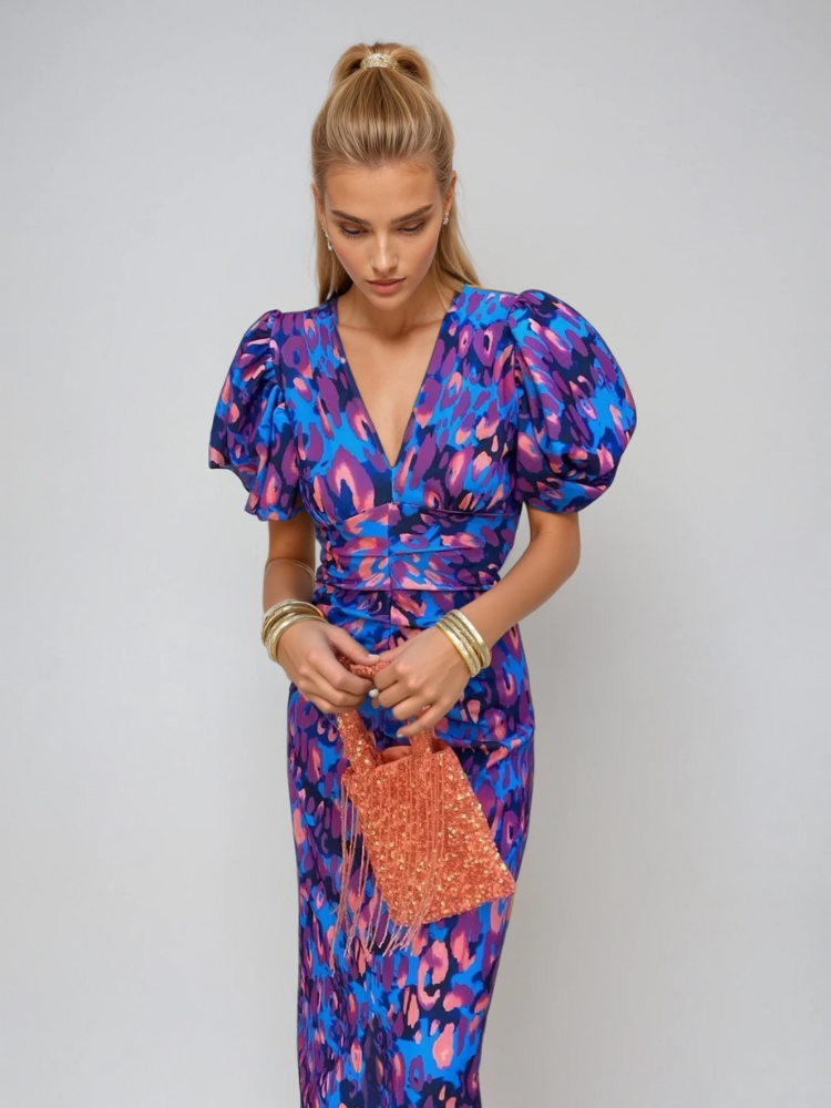 Purple-blue abstract midi dress with V-neck, puff sleeves, and gathered waist