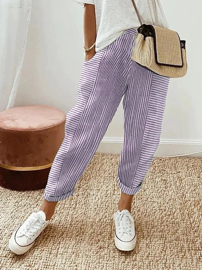 Lila striped trousers with wide legs and cuffed ankle hems