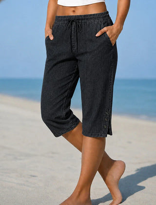 Delphia™ women's calf-length capri pants in black with drawstring waist and side buttons