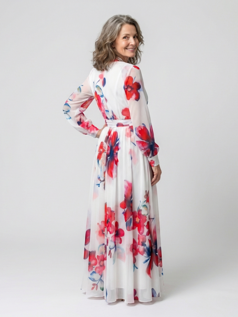 Floral long-sleeve wrap maxi dress in white with red and blue blooms; tie at waist