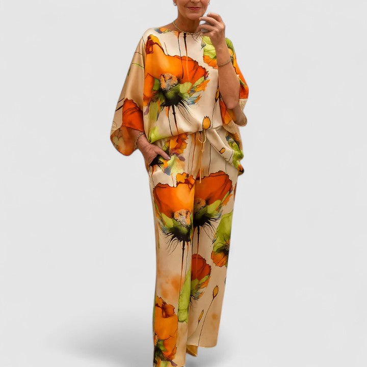 Two-piece set with short-sleeve caftan top and wide-leg pants, orange floral print
