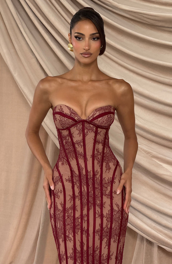 Burgundy strapless lace maxi dress with sweetheart neckline and fitted corset shape