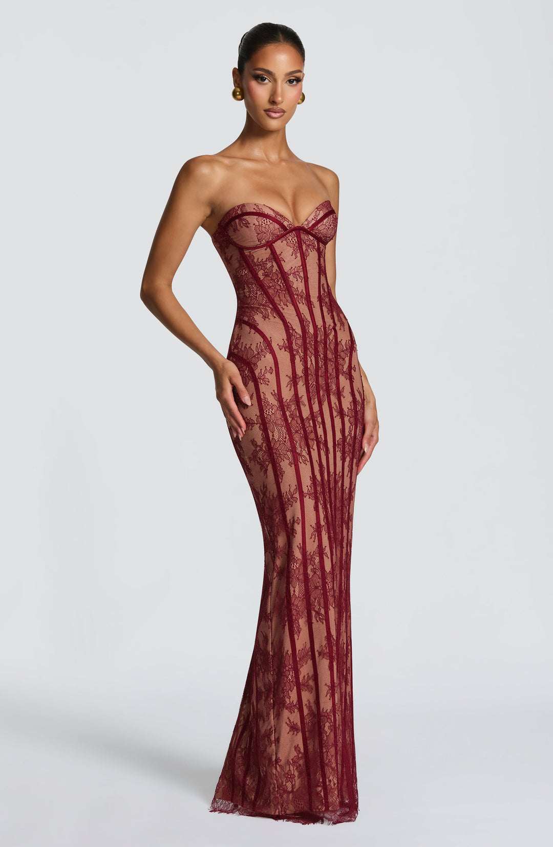 Burgundy strapless corset maxi dress with sweetheart neckline and vertical lace panel