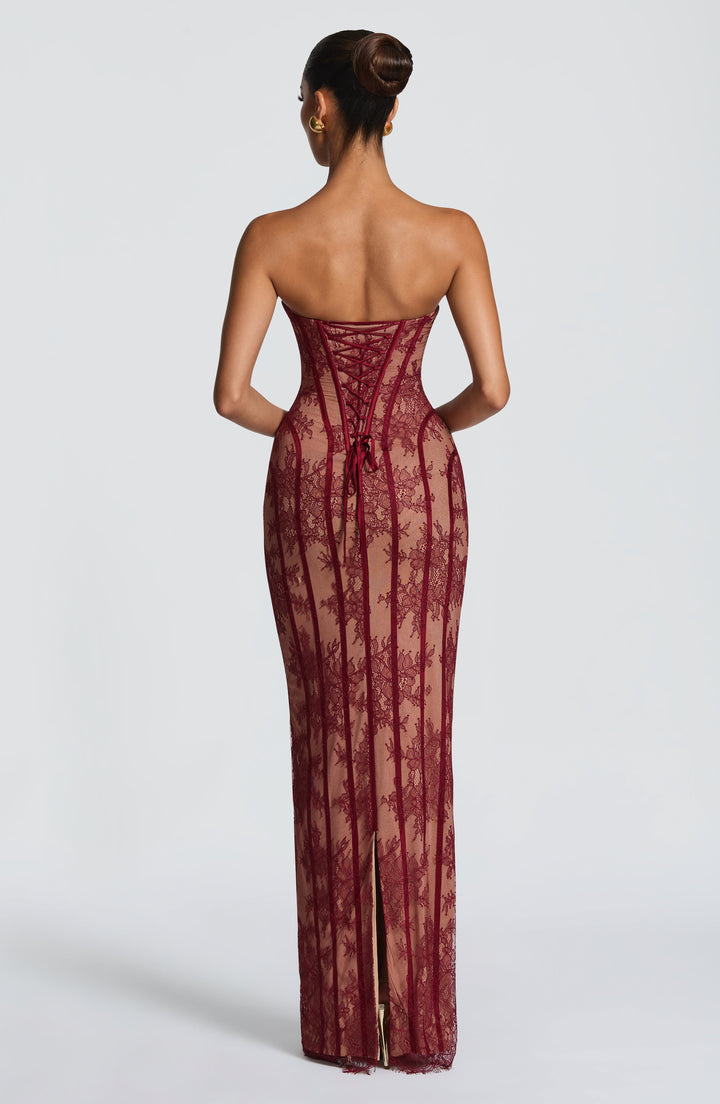Burgundy maxi dress with corset-style back and vertical stripe lace mesh