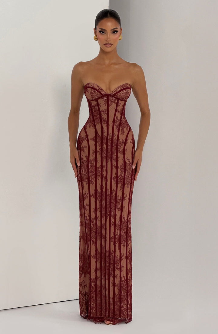 Burgundy maxi dress with corset bodice, vertical stripe texture, spaghetti straps