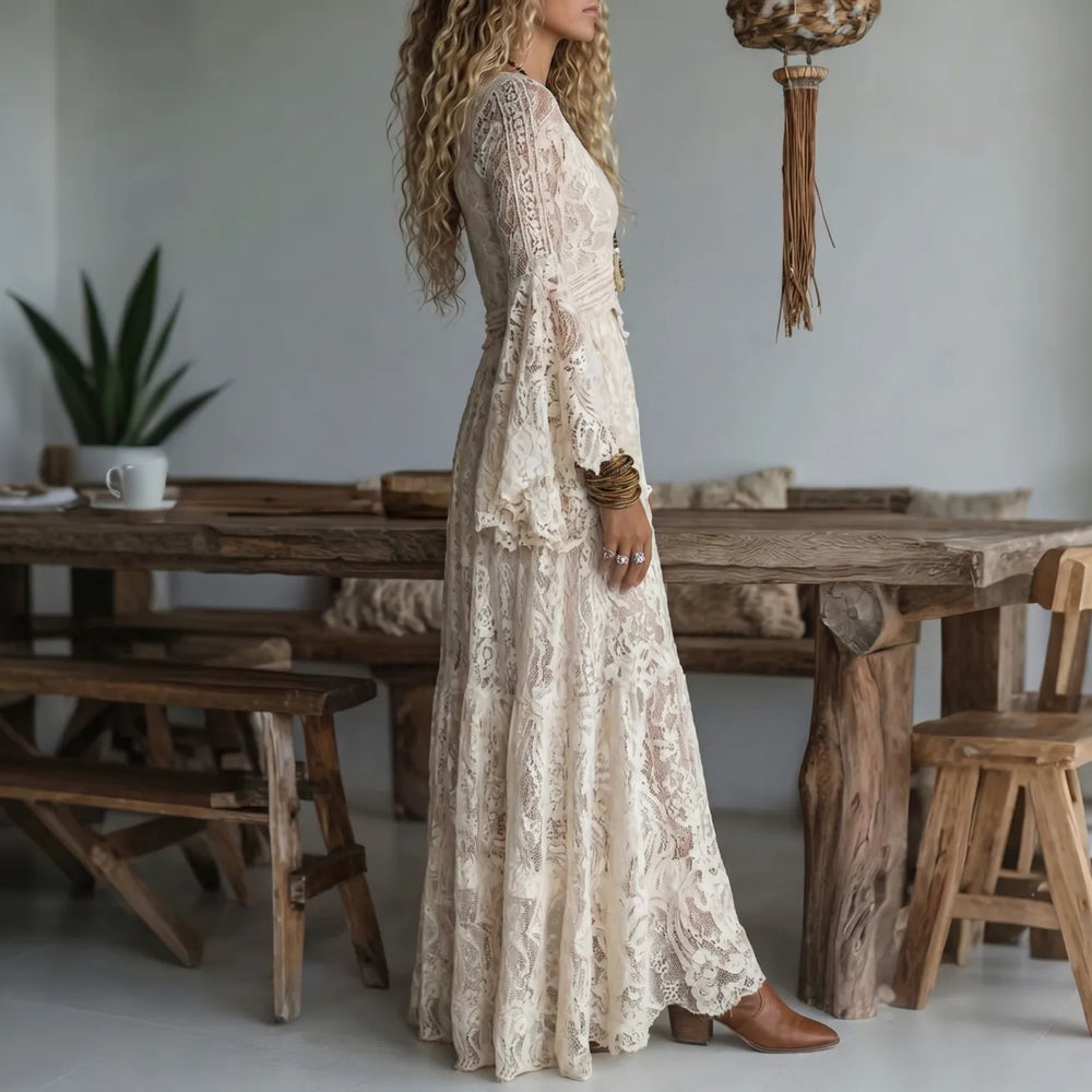 Ivory lace maxi dress with V-neck and long bell sleeves, side view