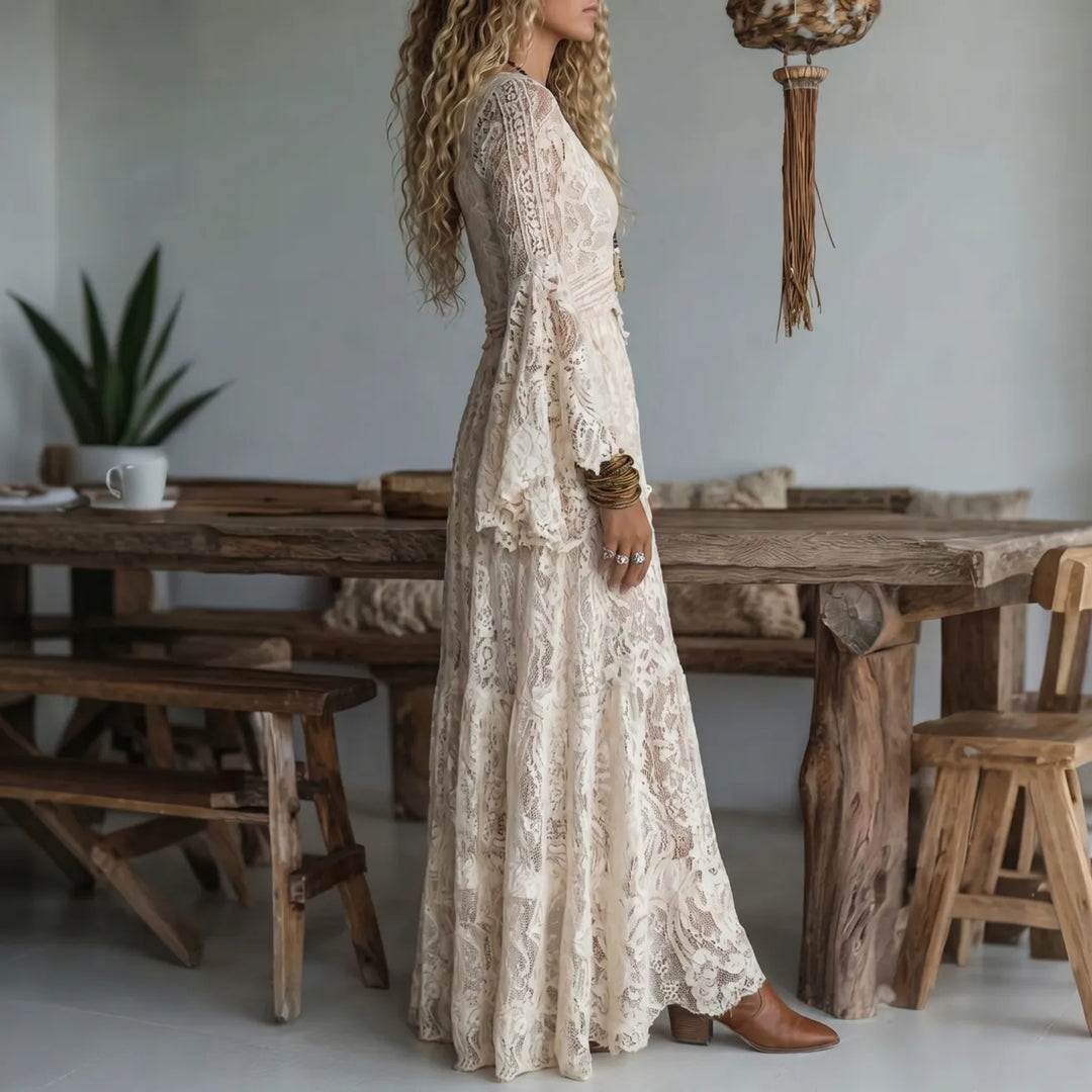 Ivory lace maxi dress with V-neck and long bell sleeves, side view