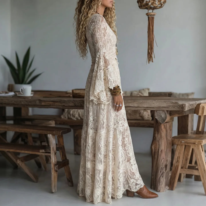Ivory lace maxi dress with V-neck and long bell sleeves, side view