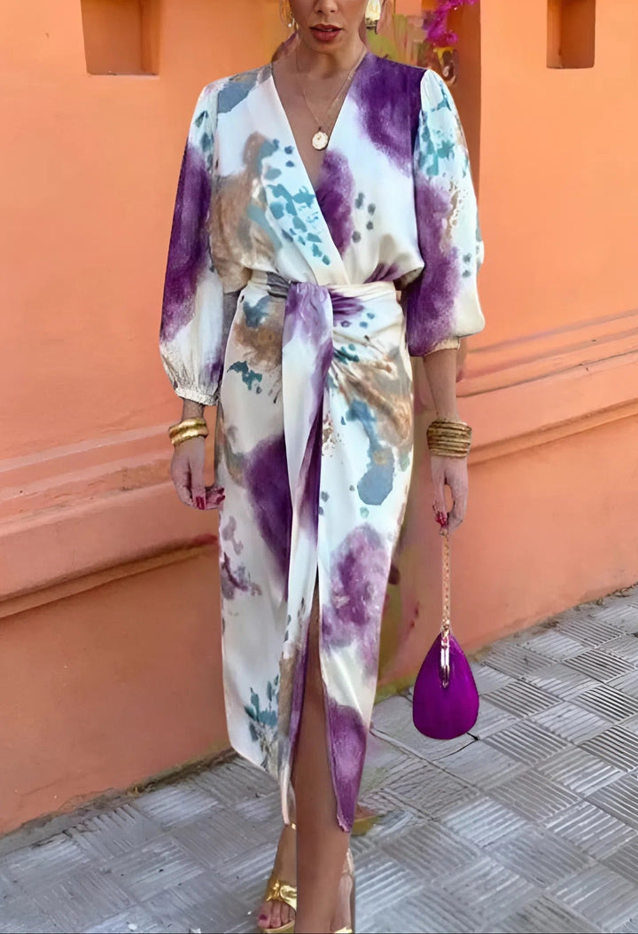 Watercolor print maxi dress with V-neck wrap front, tie waist, thigh-high slit, sleeves.