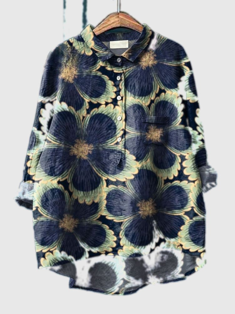 Blue floral button-up shirt with collared neckline and long sleeves