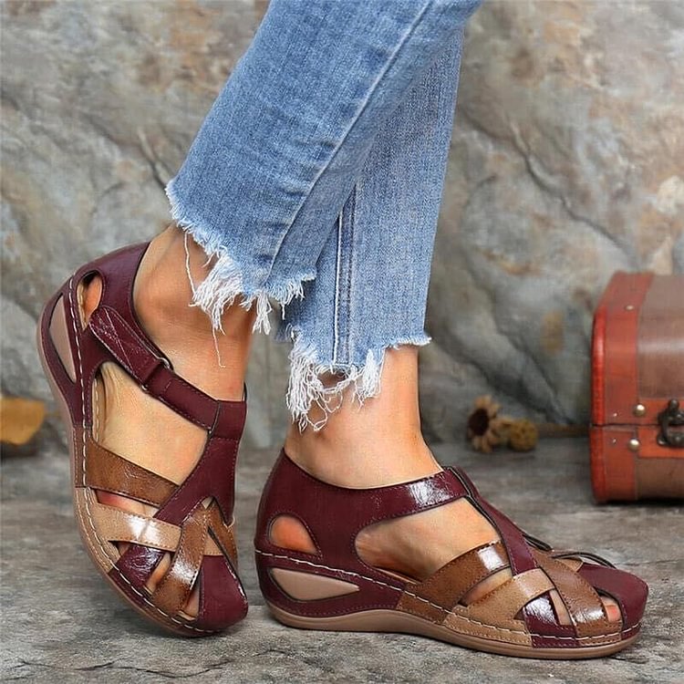 Maroon casual sandals with tan leather straps and low cushioned sole