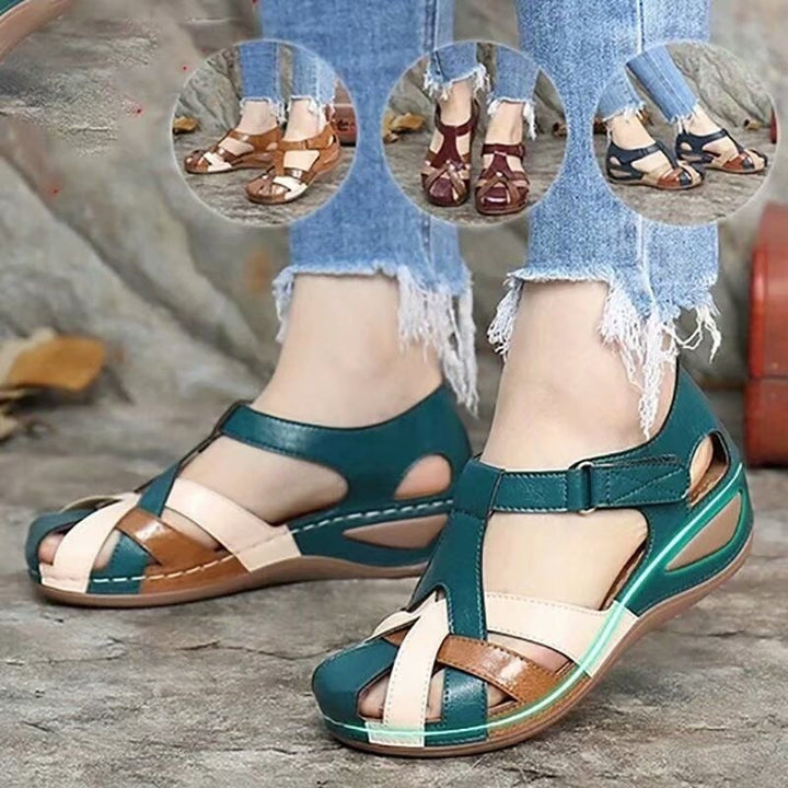 Teal casual sandals with white straps and cushioned platform sole
