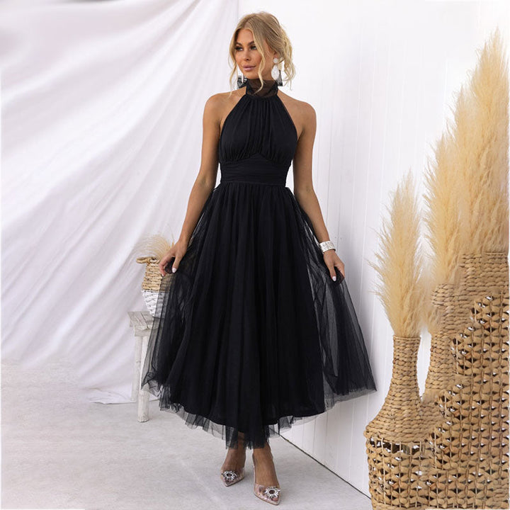 Black halter tulle midi dress with high neckline and full gathered skirt