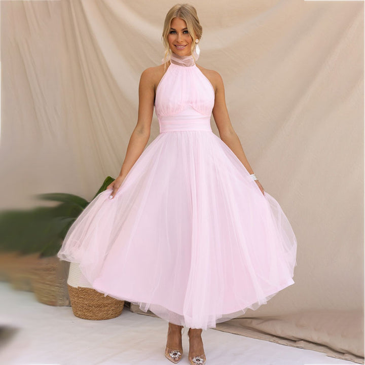 Light pink halter tulle midi dress with high neck and gathered skirt