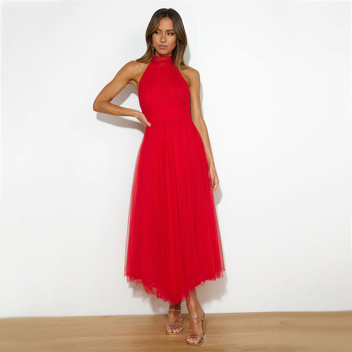 Red halter turtleneck midi dress with sleeveless fitted bodice and flared tulle skirt