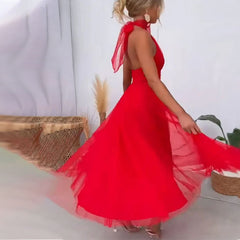 Red halter tulle dress with open-back strap and flared skirt