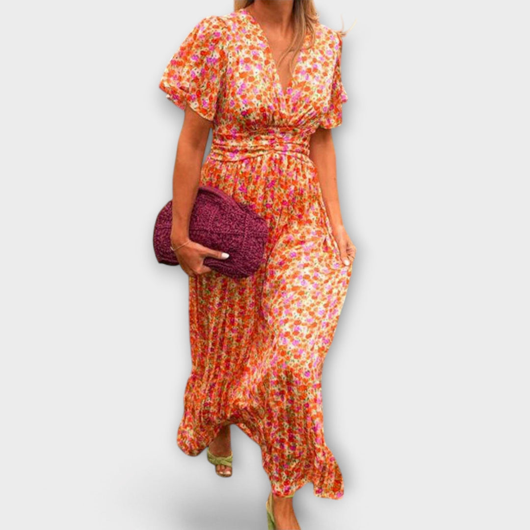 Orange floral V-neck midi dress, short sleeves, gathered waist; side view