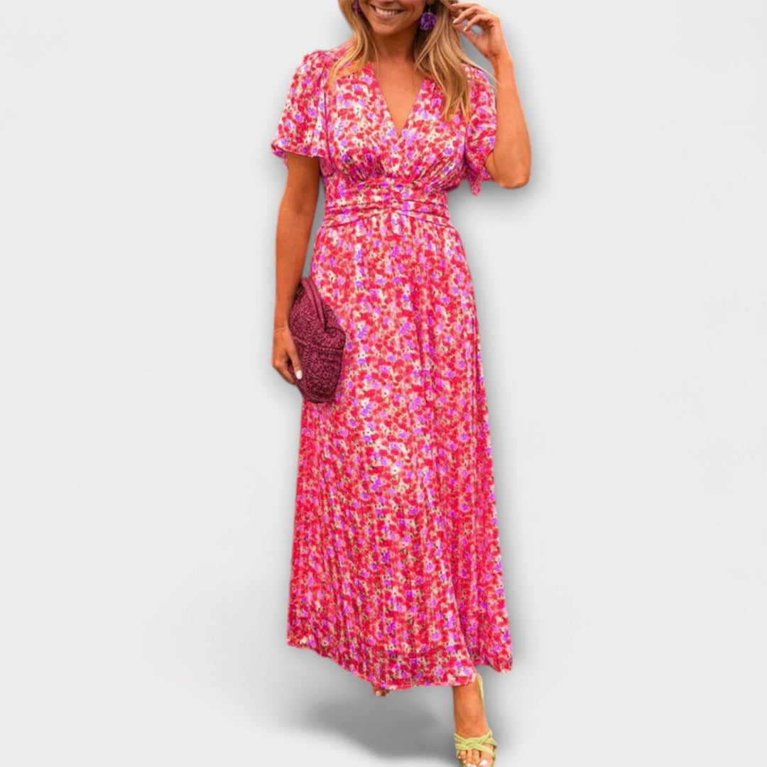 Pink-red floral V-neck midi dress with short sleeves and gathered waist