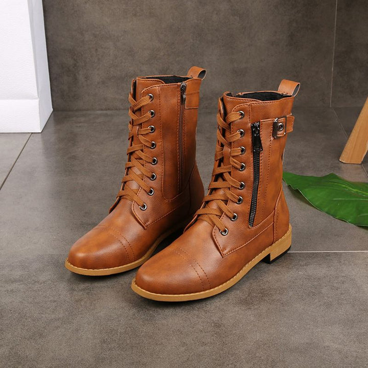 Brown round-toe lace-up ankle boots with side zip and buckle strap