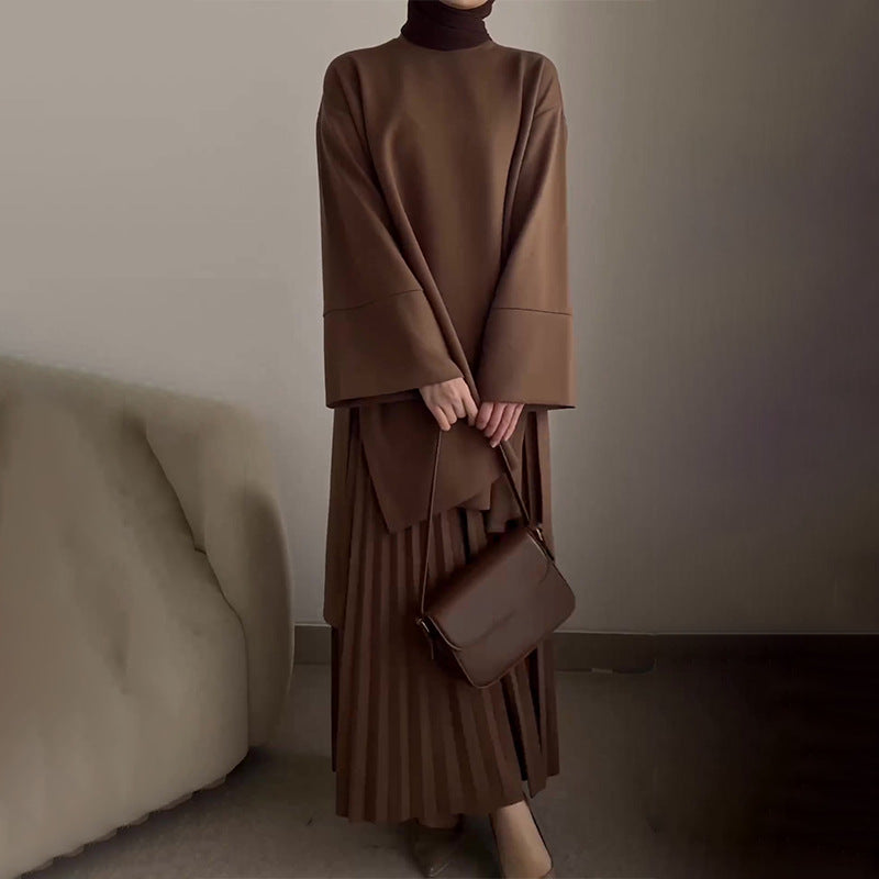 Women's pleated two-piece set, draped brown top with wide sleeves and pleated midi skirt
