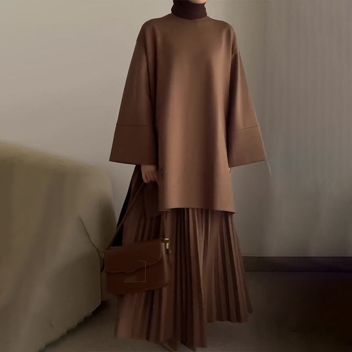 Women's pleated two-piece set, long brown top with loose sleeves over pleated midi skirt