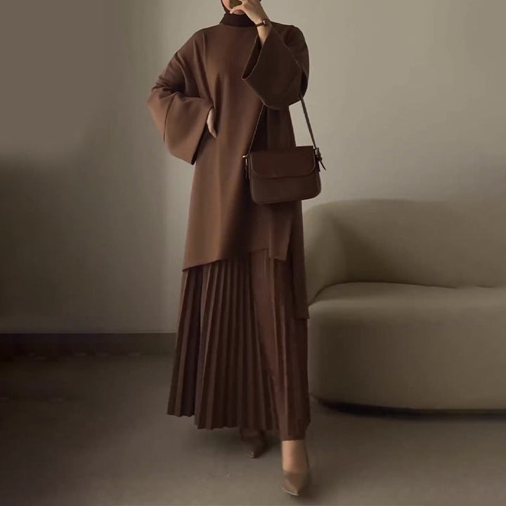 Women's pleated two-piece set, draped brown mock-neck top with wide sleeves and pleated midi skirt