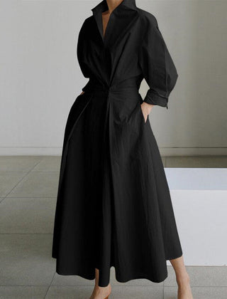 Black shirt dress with button front, long sleeves, and tie waist detail