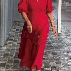 Red puff-sleeve midi dress with keyhole neckline and subtle front seam detail