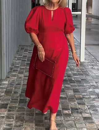 Red puff-sleeve midi dress with keyhole neckline and subtle front seam detail