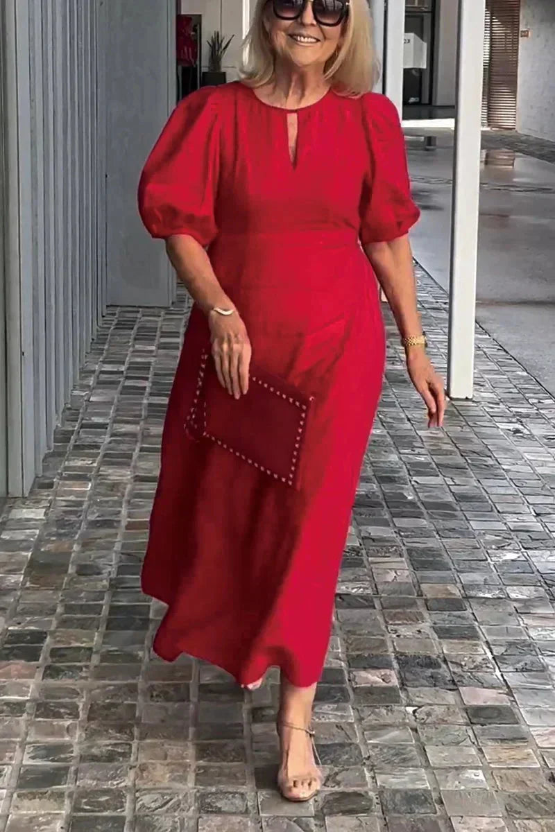 Red puff-sleeve midi dress with keyhole neckline and subtle front seam detail