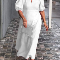 White puff-sleeve midi dress with keyhole neckline and subtle front seam detail