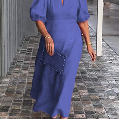 Blue puff-sleeve midi dress with keyhole neckline and subtle front seam detail
