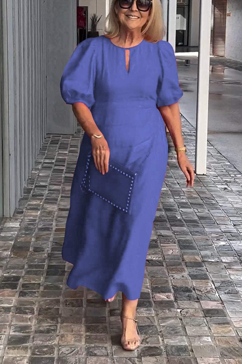 Blue puff-sleeve midi dress with keyhole neckline and subtle front seam detail