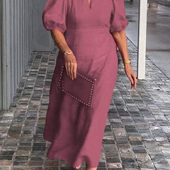 Dark pink puff-sleeve midi dress with keyhole neckline and subtle front seam detail
