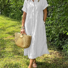 White striped maxi dress with short sleeves, button front and pockets