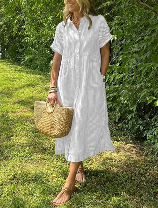 White striped maxi dress with short sleeves, button front and pockets