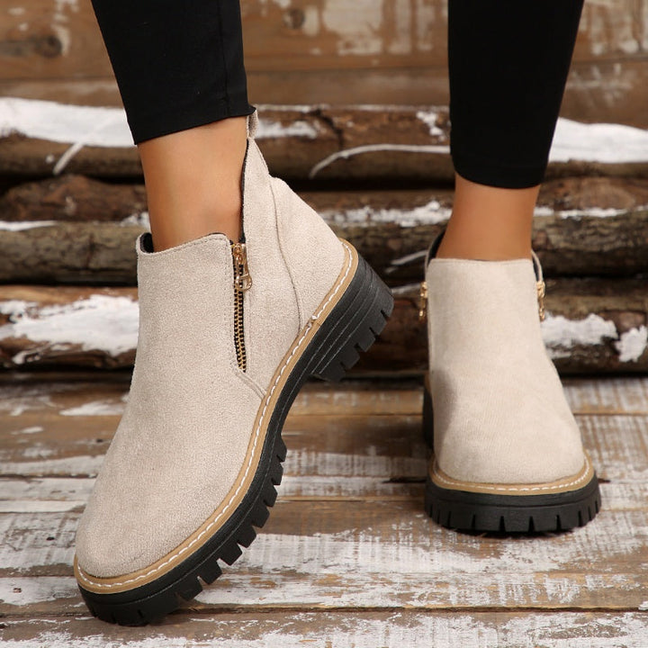 Suede ankle boots with side zip and chunky sole, light beige with tan trim