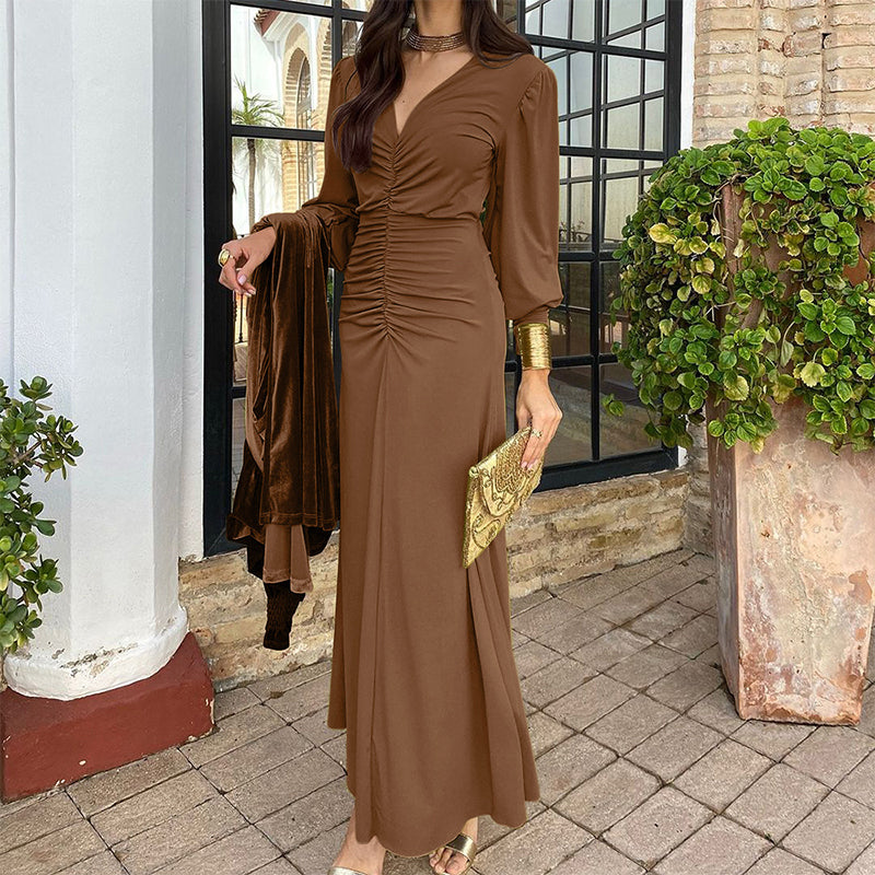 Brown V-neck ruched dress with long sleeves and gathered waist, midi hemline