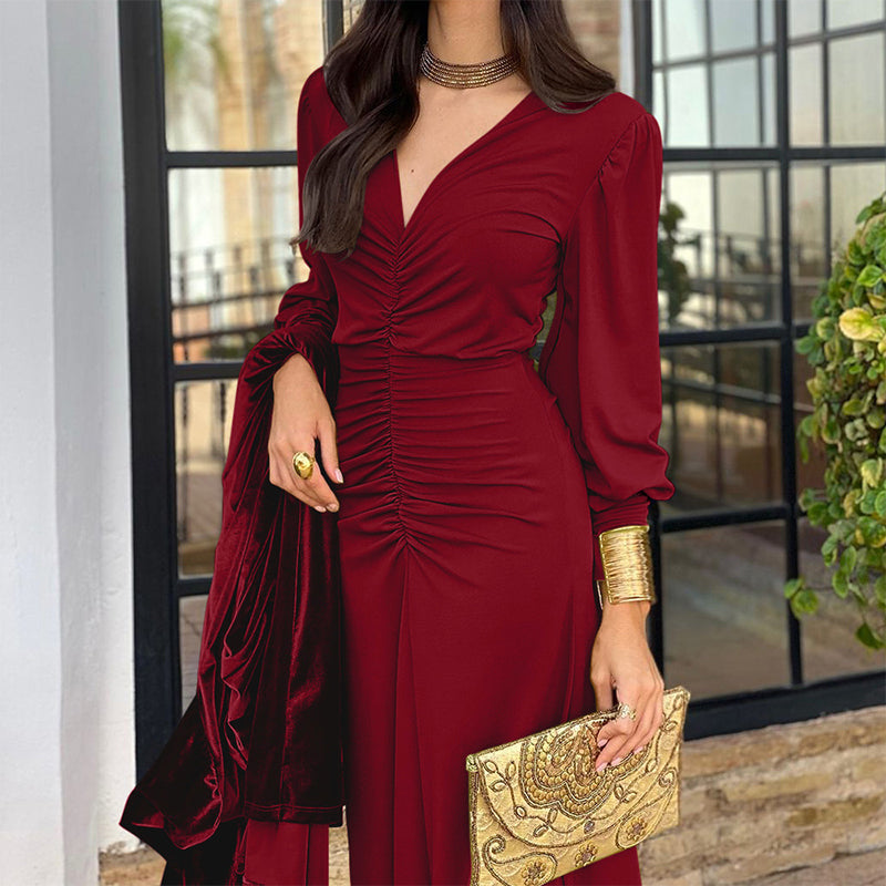 Burgundy V-neck gathered dress with long sleeves and ruched front, midi length