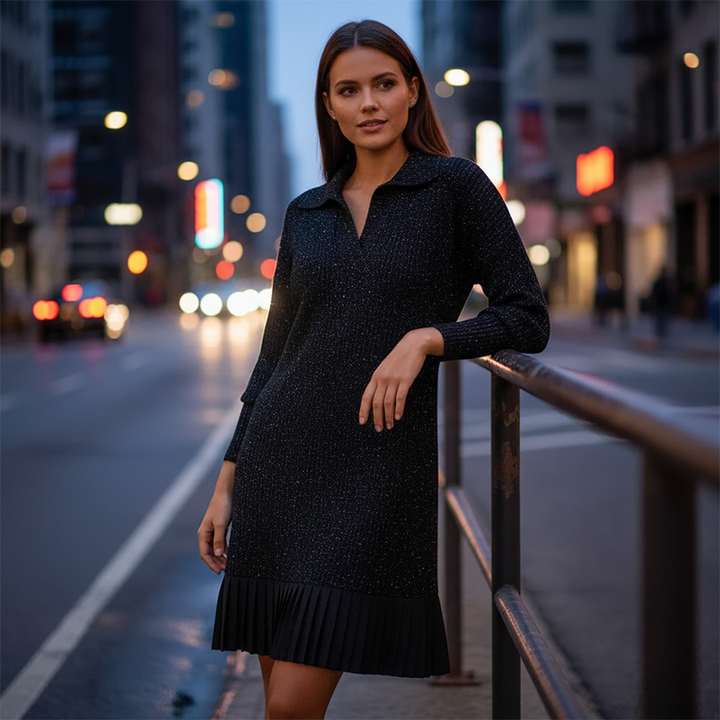 Black textured long-sleeve knit dress with V-neck and pleated hem